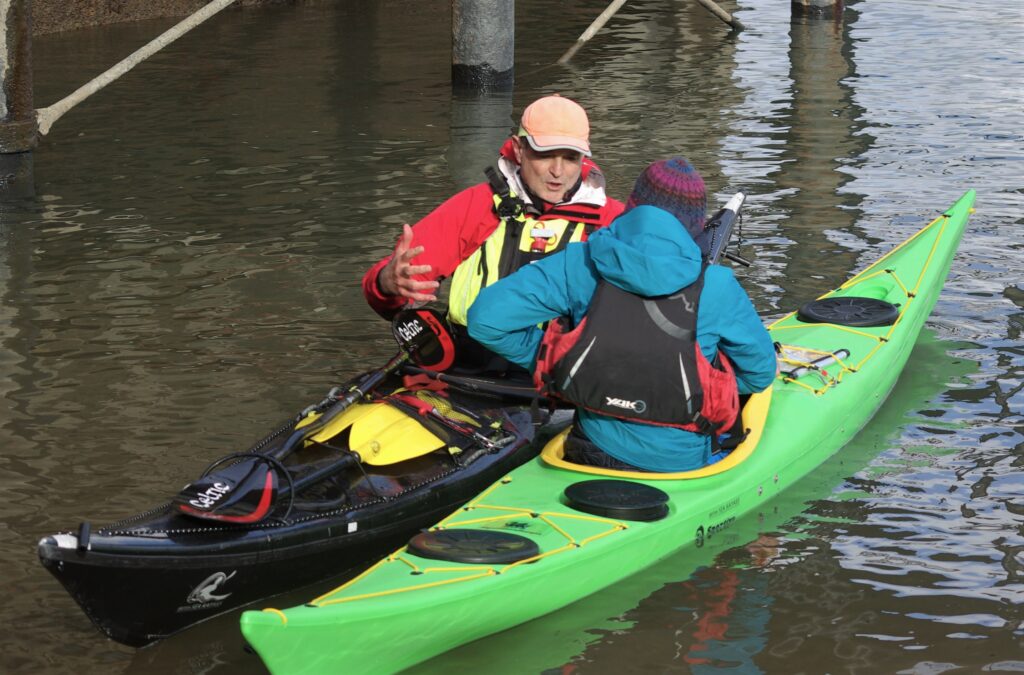 One-to-one coaching in a sea kayak with Rick Cooper British Sea Kayaks