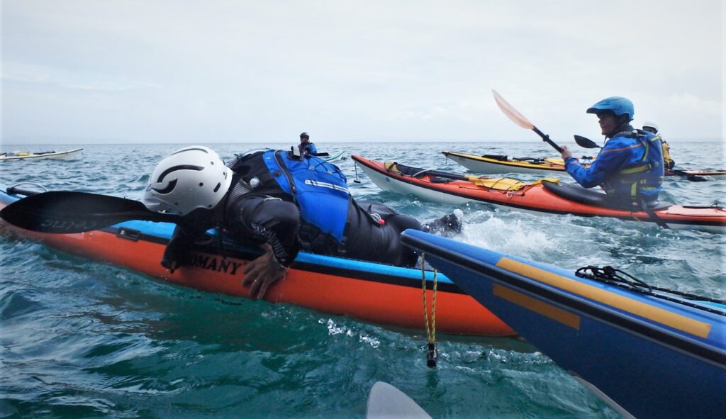 Sea kayak self-rescue - group practice session